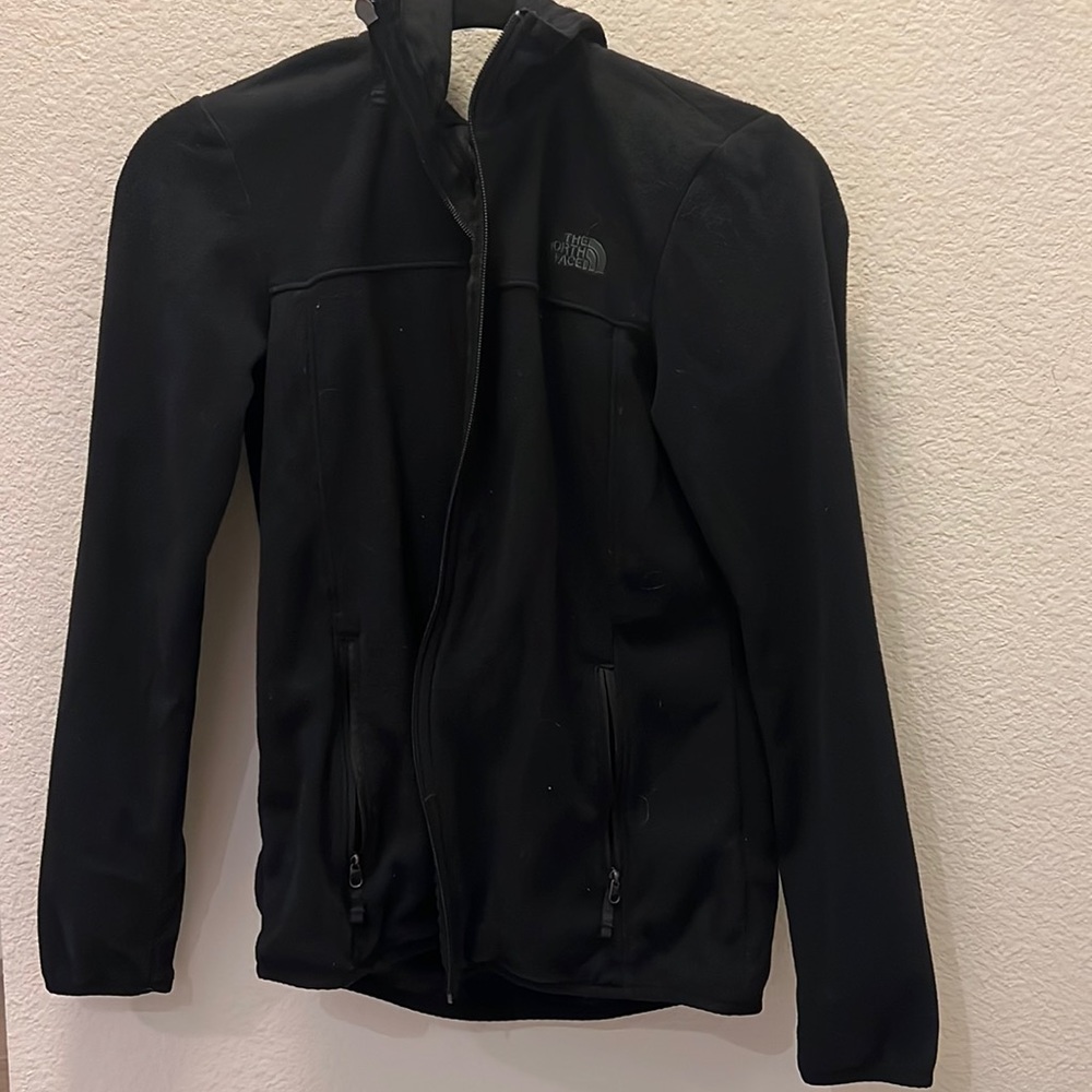 The north face black fleece jacket. Only worn a few times. Has hood.